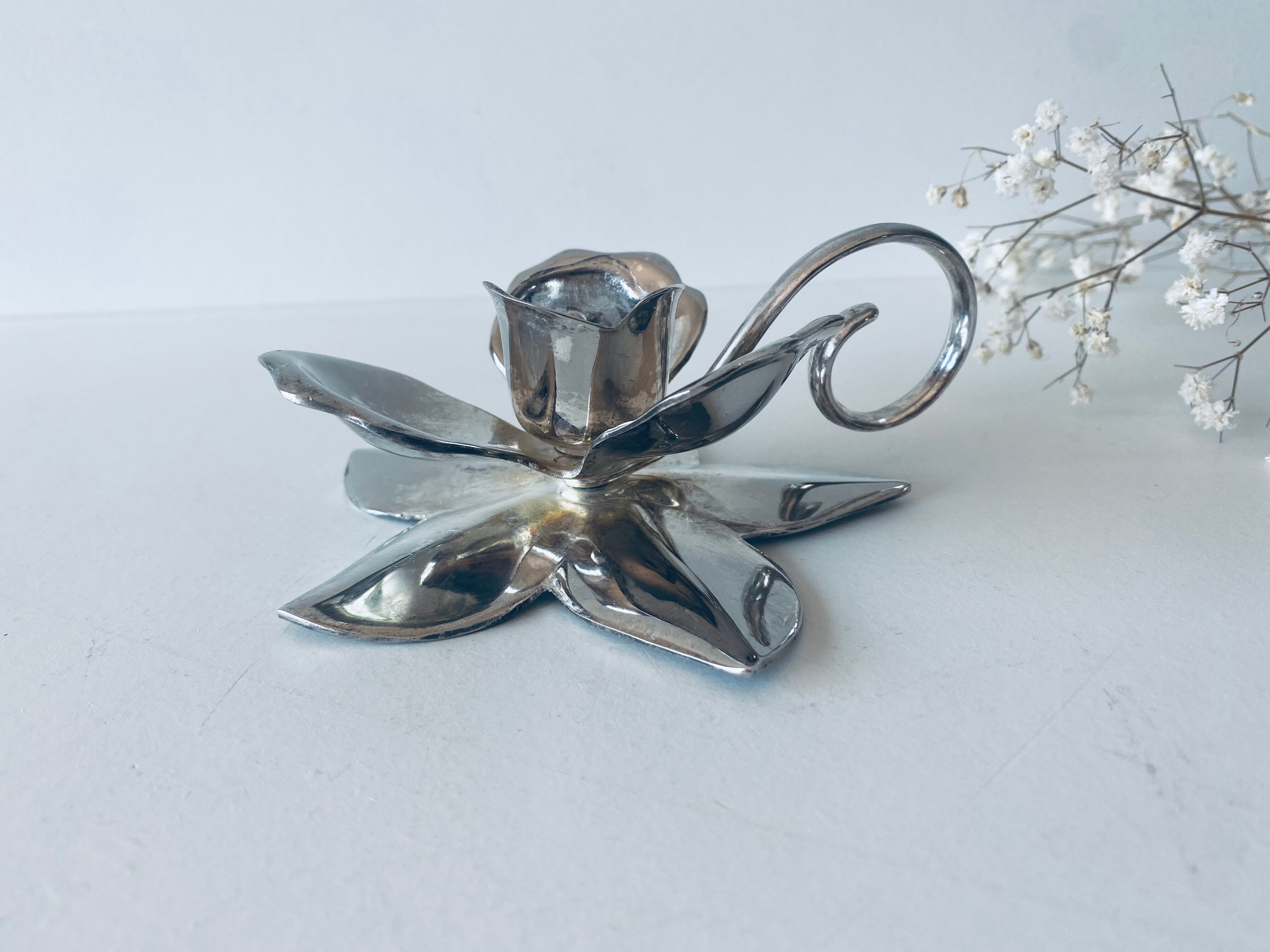 Silver flower candle holder