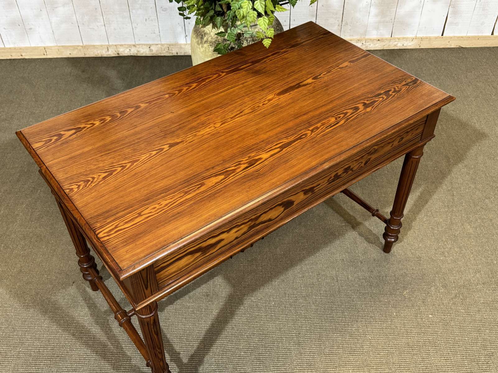 Desk table from the early 20th century in pitch pine.