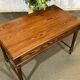 Desk table from the early 20th century in pitch pine.