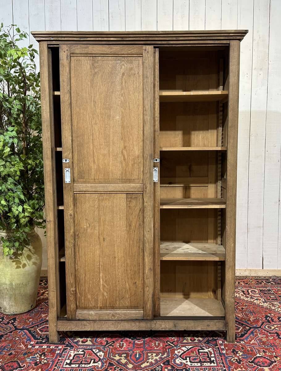 Oak wardrobe with sliding doors from the 1930s.