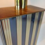 Pair of black and gold art deco style lamps