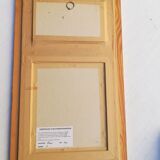 Wooden mirror with floral composition