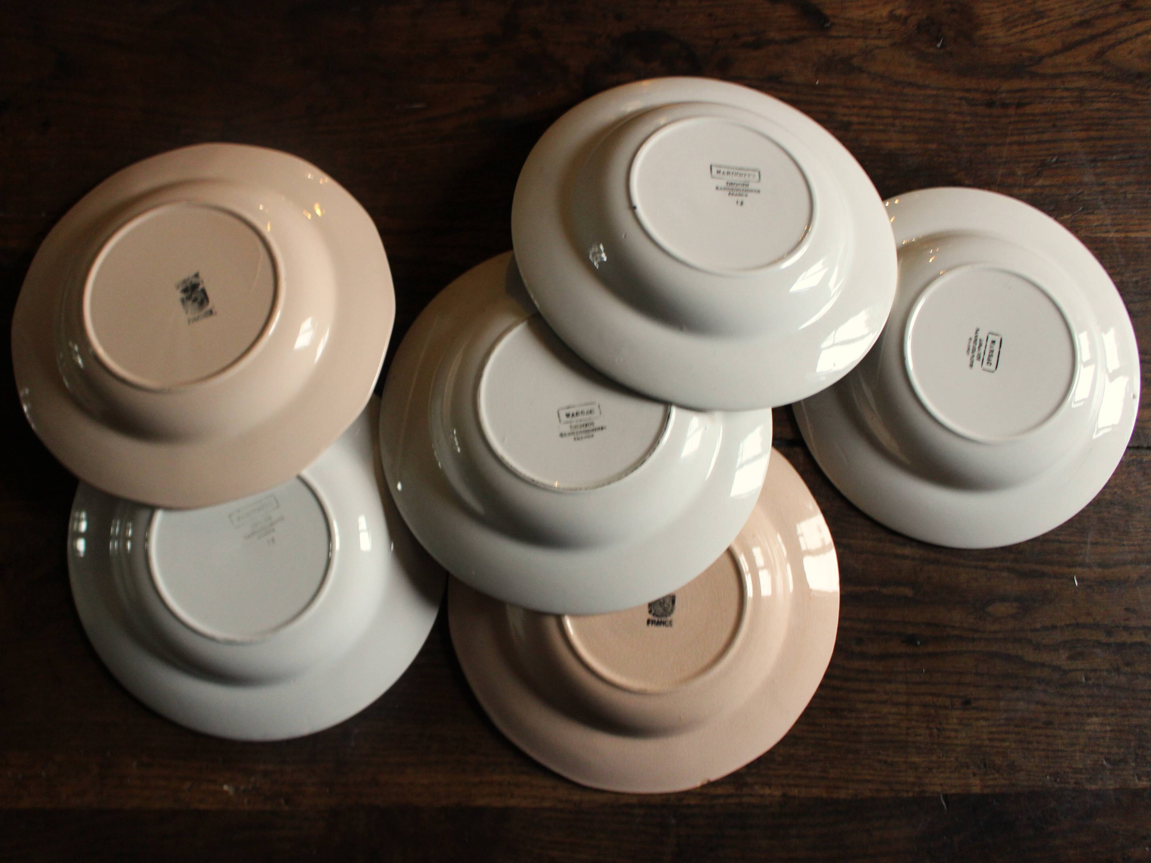 6 mismatched soup plates Digoin Sarreguemines red blue pink