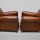 Paire de fauteuils club en cuir avec dossier moustache et cognac, France, 1940s