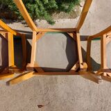 3 vintage bridge chairs with rounded armrests.