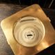 Italian gold-plated bottle cooler, architectural ribbed design.