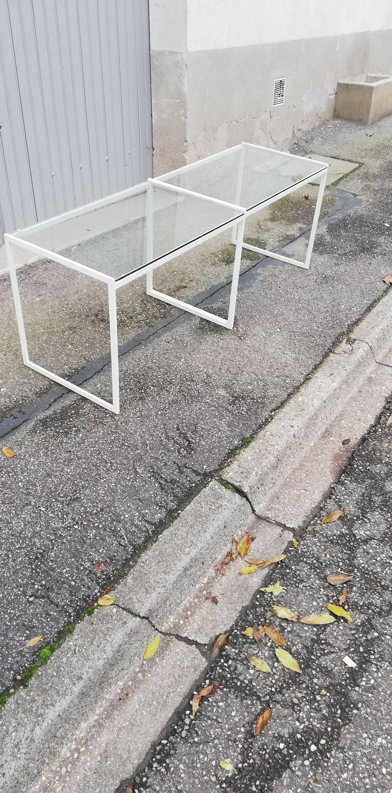 Pair of vintage metal and glass coffee tables
