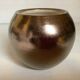 Small round vase, cracked golden ceramic.