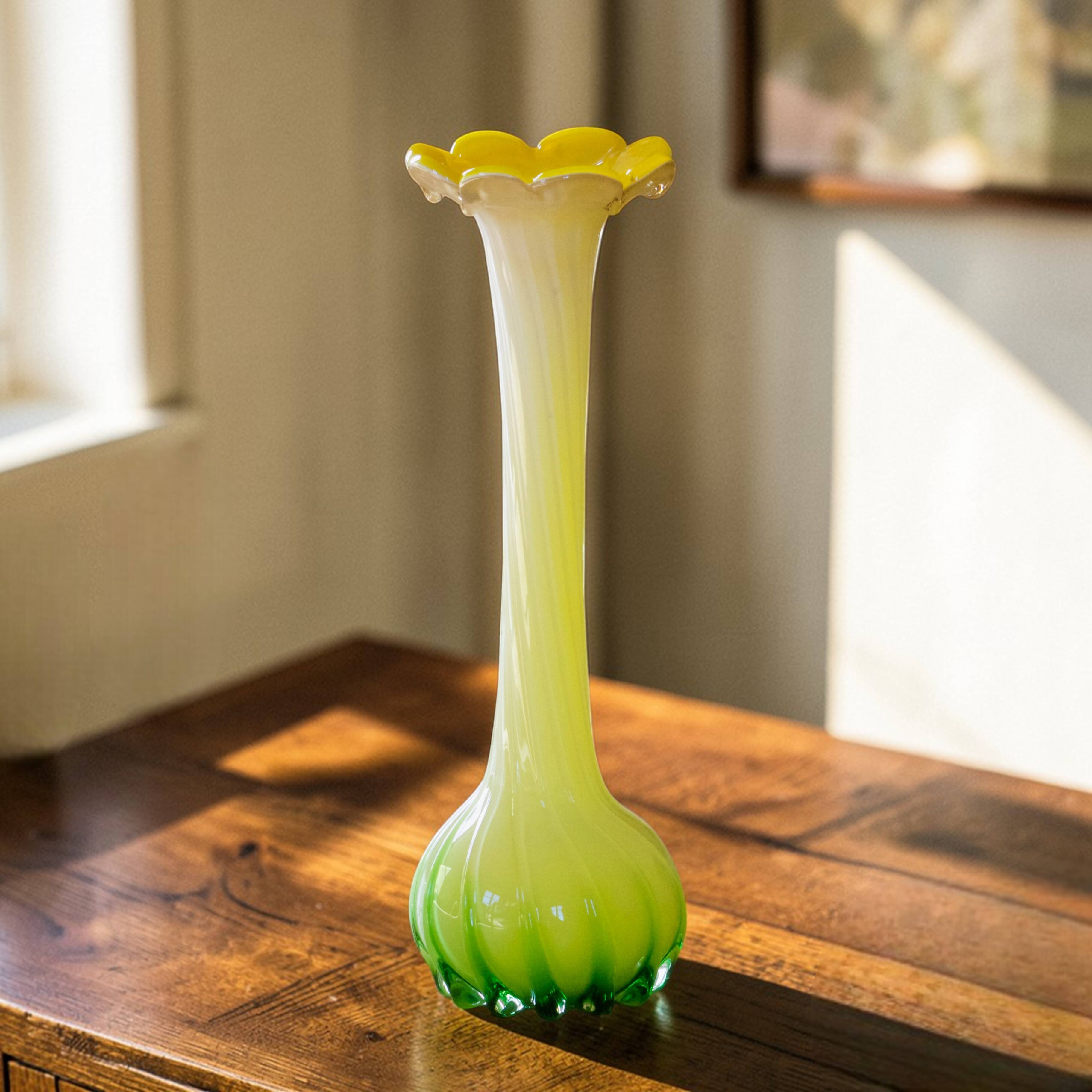 Blown glass vase from Murano in the shape of a yellow flower.