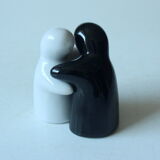 Ceramic salt and pepper shaker hugging ghosts, vintage from the 1980s