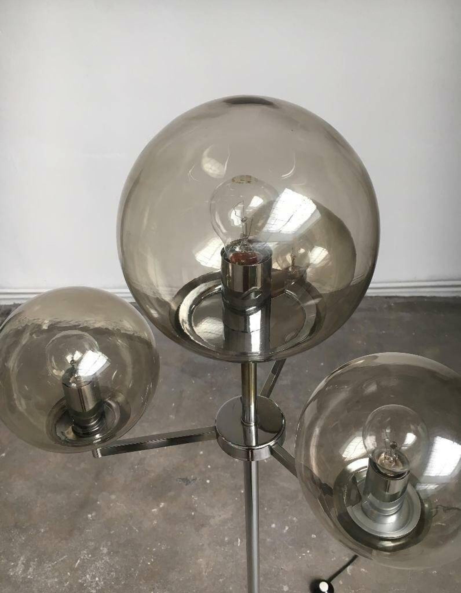 Chrome and glass floor lamp in mid-century German space style by Hustadt Leuchten, 1960s.