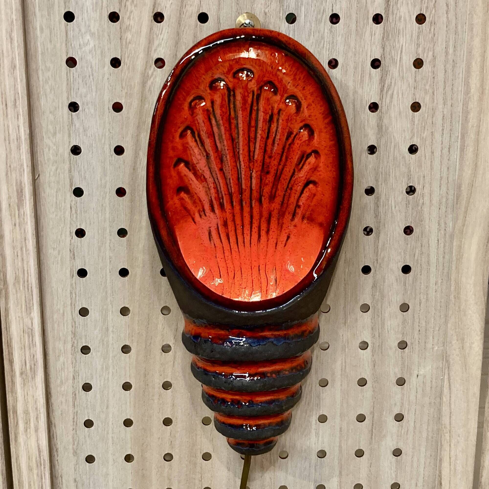 Pair of enamelled terracotta wall lights 1960.