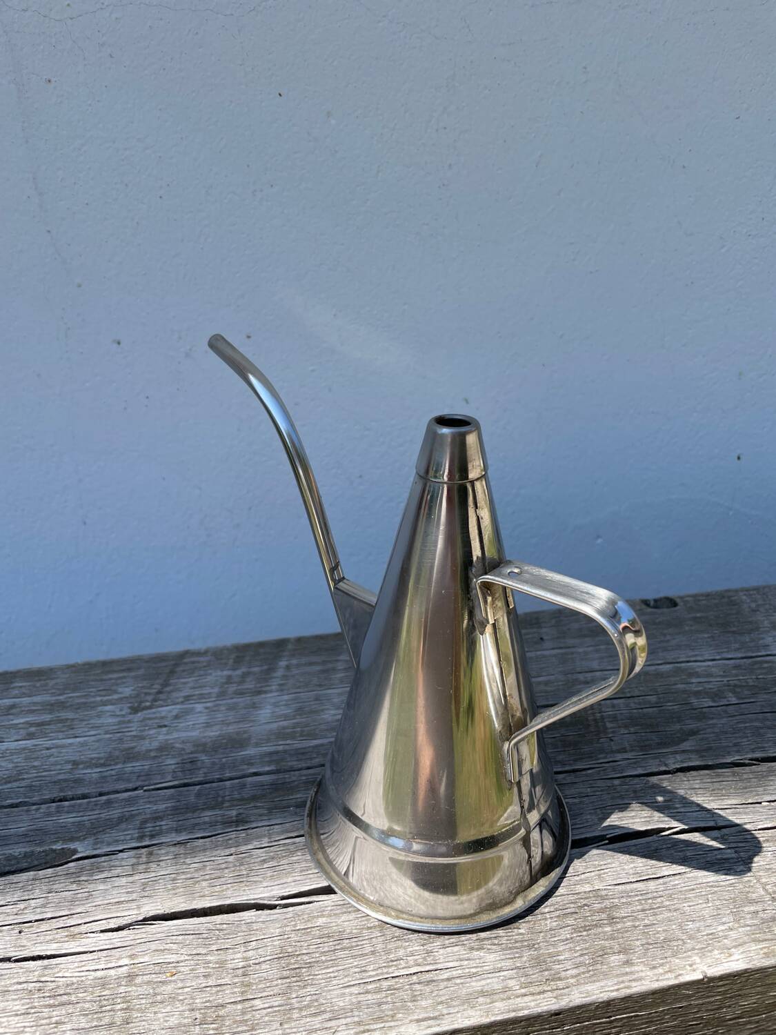 Small stainless steel watering can