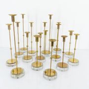 Set of 15 Scandinavian candle holders in brass and glass, Gunnar Ander, Ystad Met