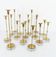 Set of 15 Scandinavian candle holders in brass and glass, Gunnar Ander, Ystad Met