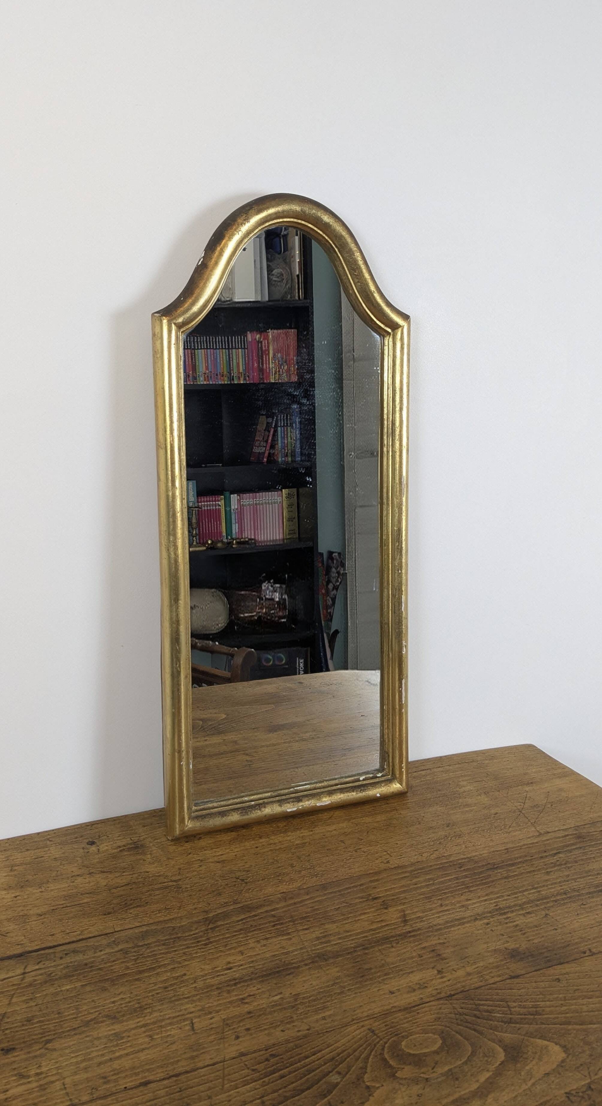 Antique gold mirror known as "gendarme's hat", patinated elegance 70 x 30 cm