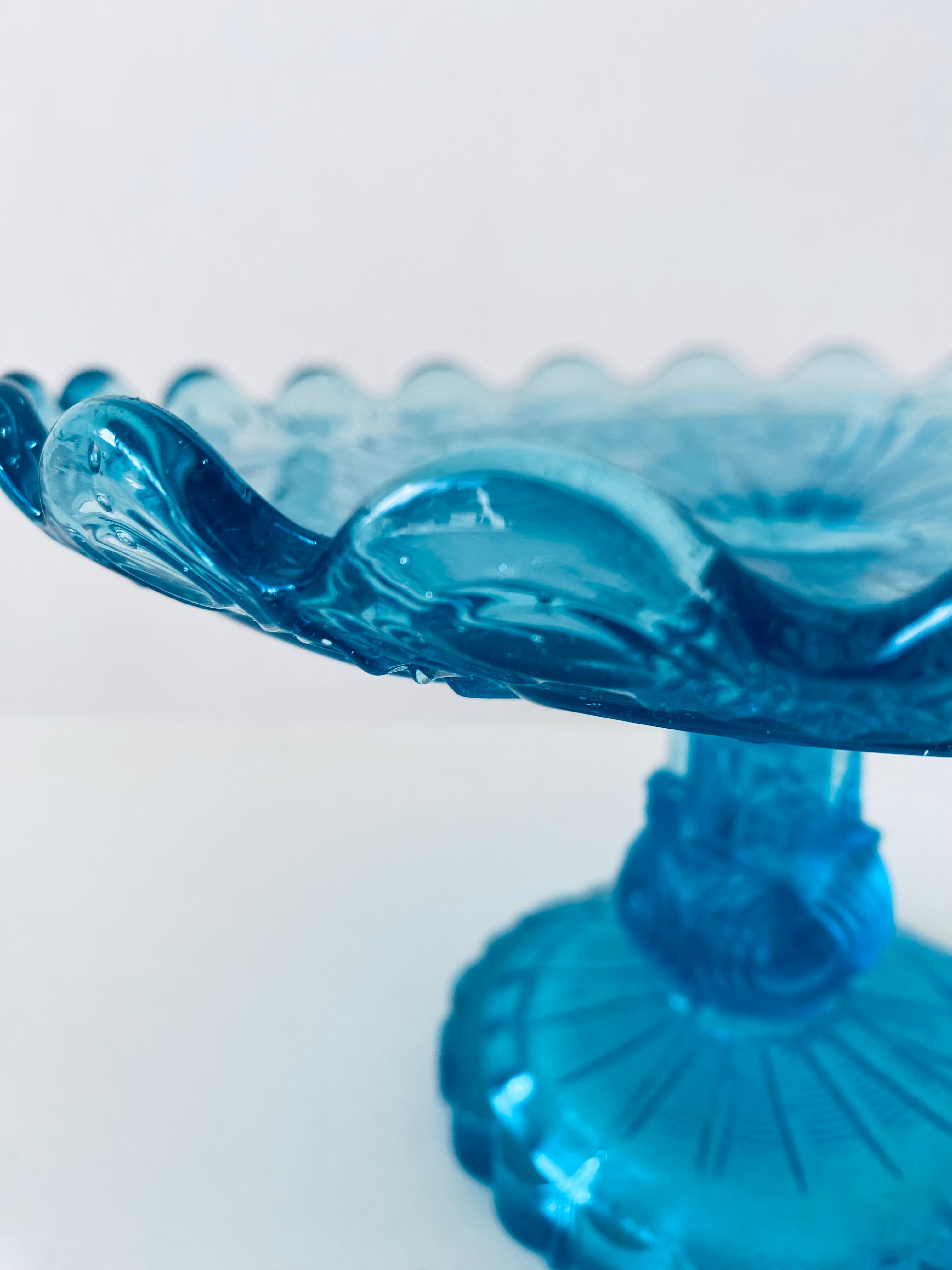 Blue glass stand cup
