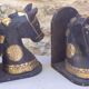 Horse bookbands in carved wood and brass