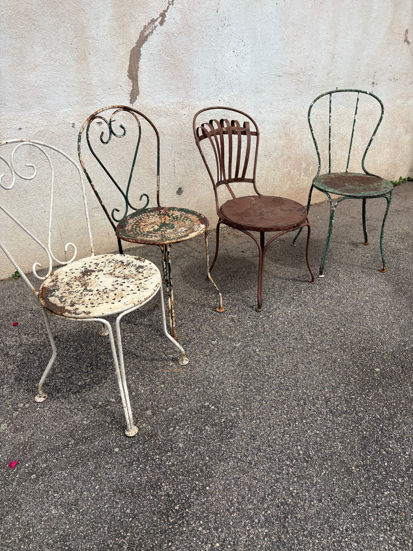 Mélange of vintage garden chairs