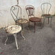 Mélange of vintage garden chairs