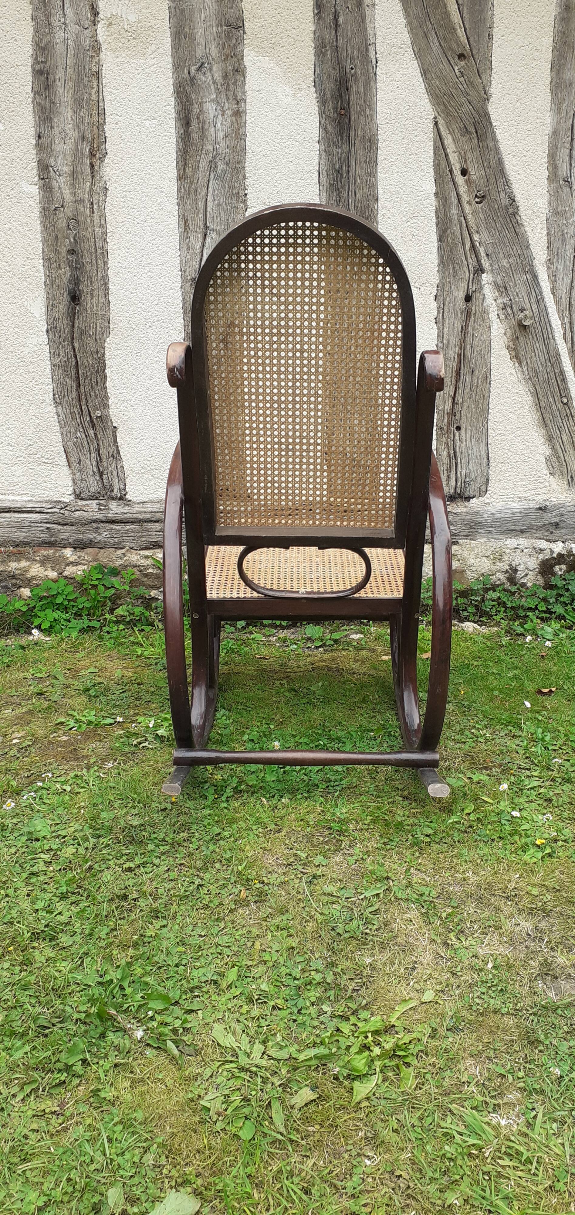 Rocking chair with vintage wood and canework