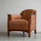Art Deco armchair in solid oak and leather by Frits Schuitema