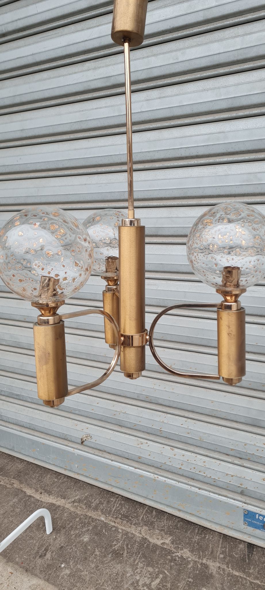 Brass and blown glass chandelier inlaid with gold