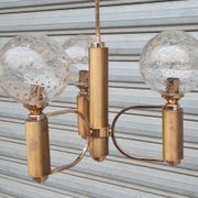 Brass and blown glass chandelier inlaid with gold