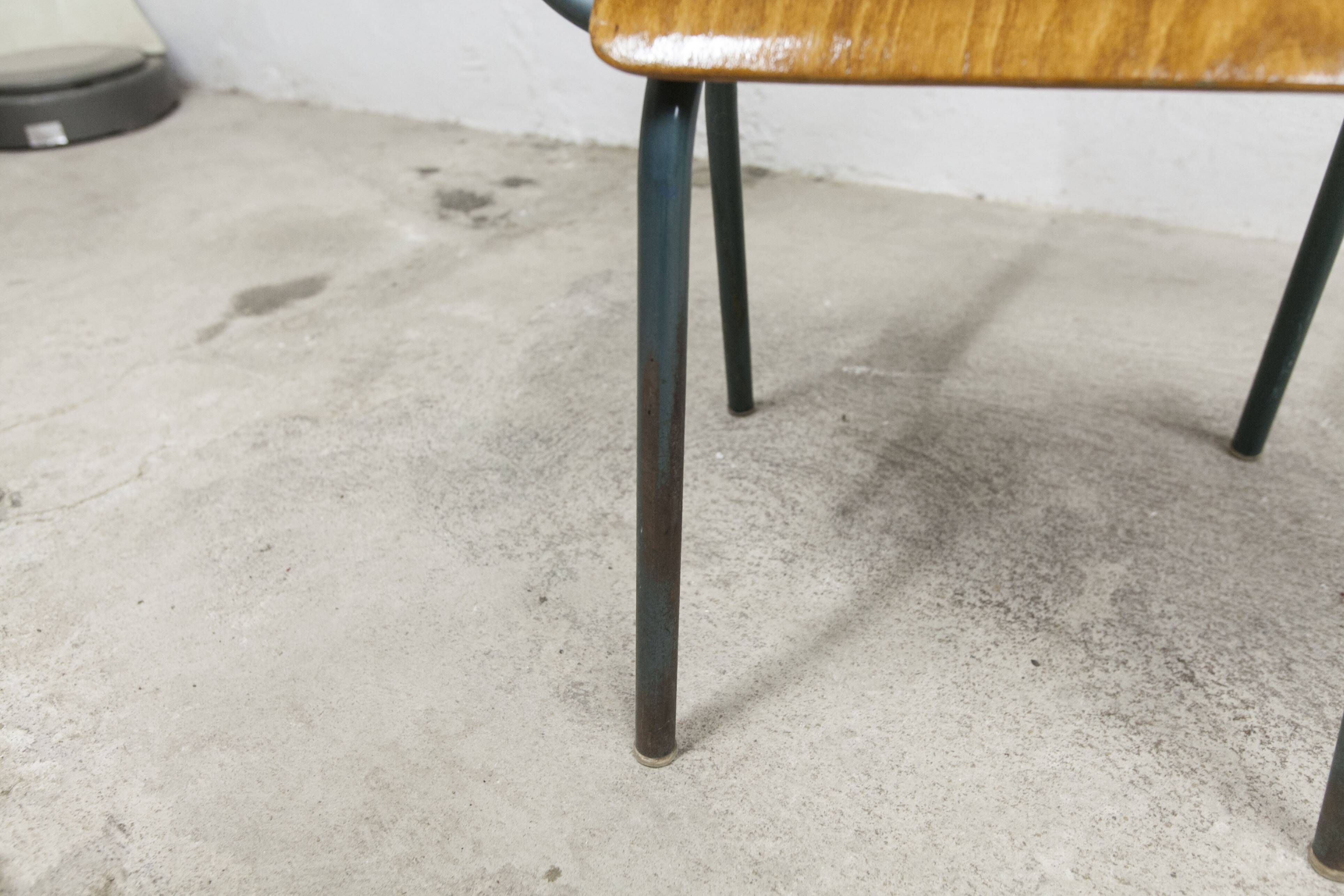 1962 school teacher's chair in honey color and tubular structure