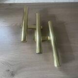 Tubular wall sconces in brass, Italian design from the 1970s, attributed.