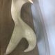 Abstract coffee table in the shape of a woman and marbled fiberglass
