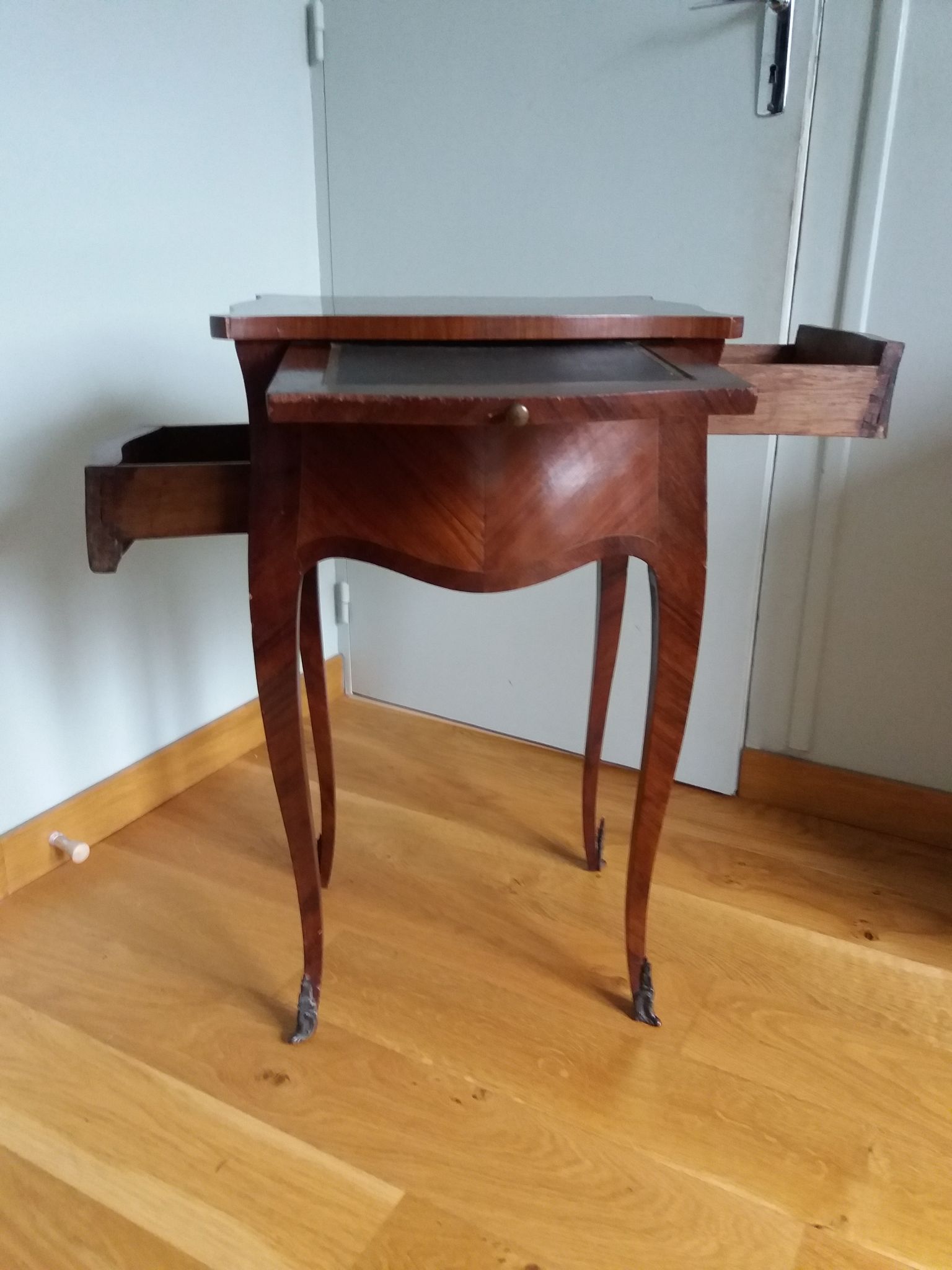 Nightstand with writing desk in Louis XV style.
