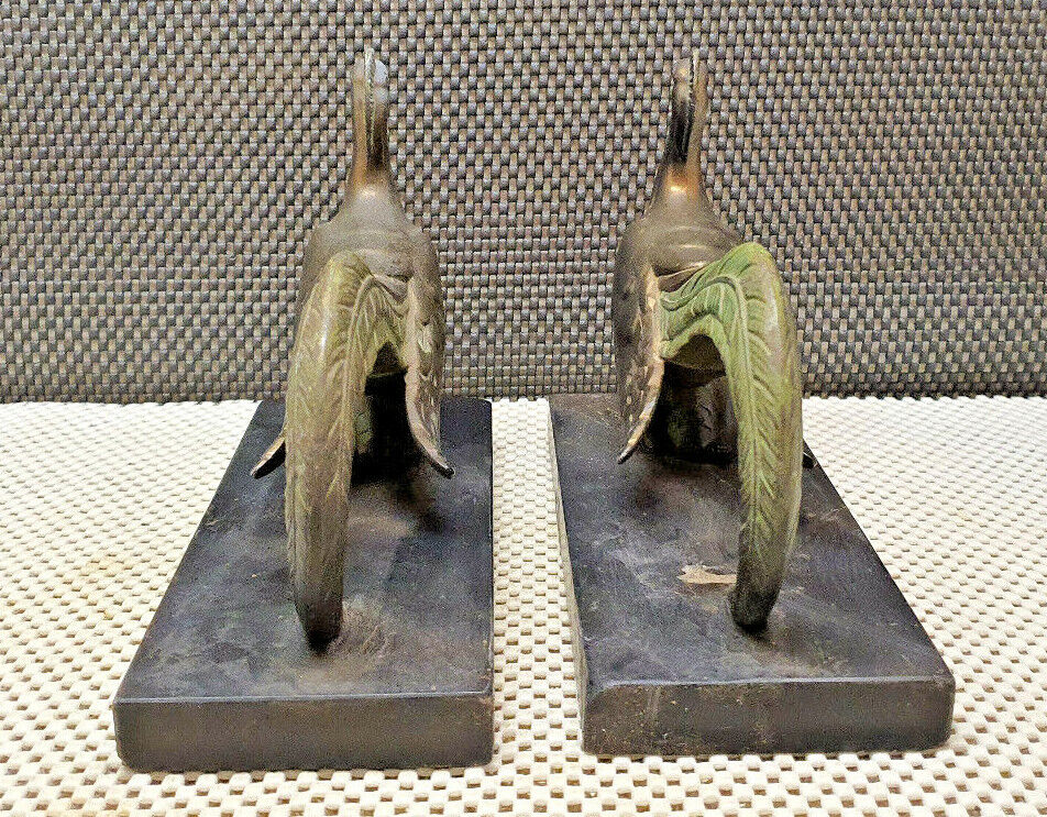 Pair of regulated and marble greenhouse books
