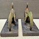 Pair of regulated and marble greenhouse books