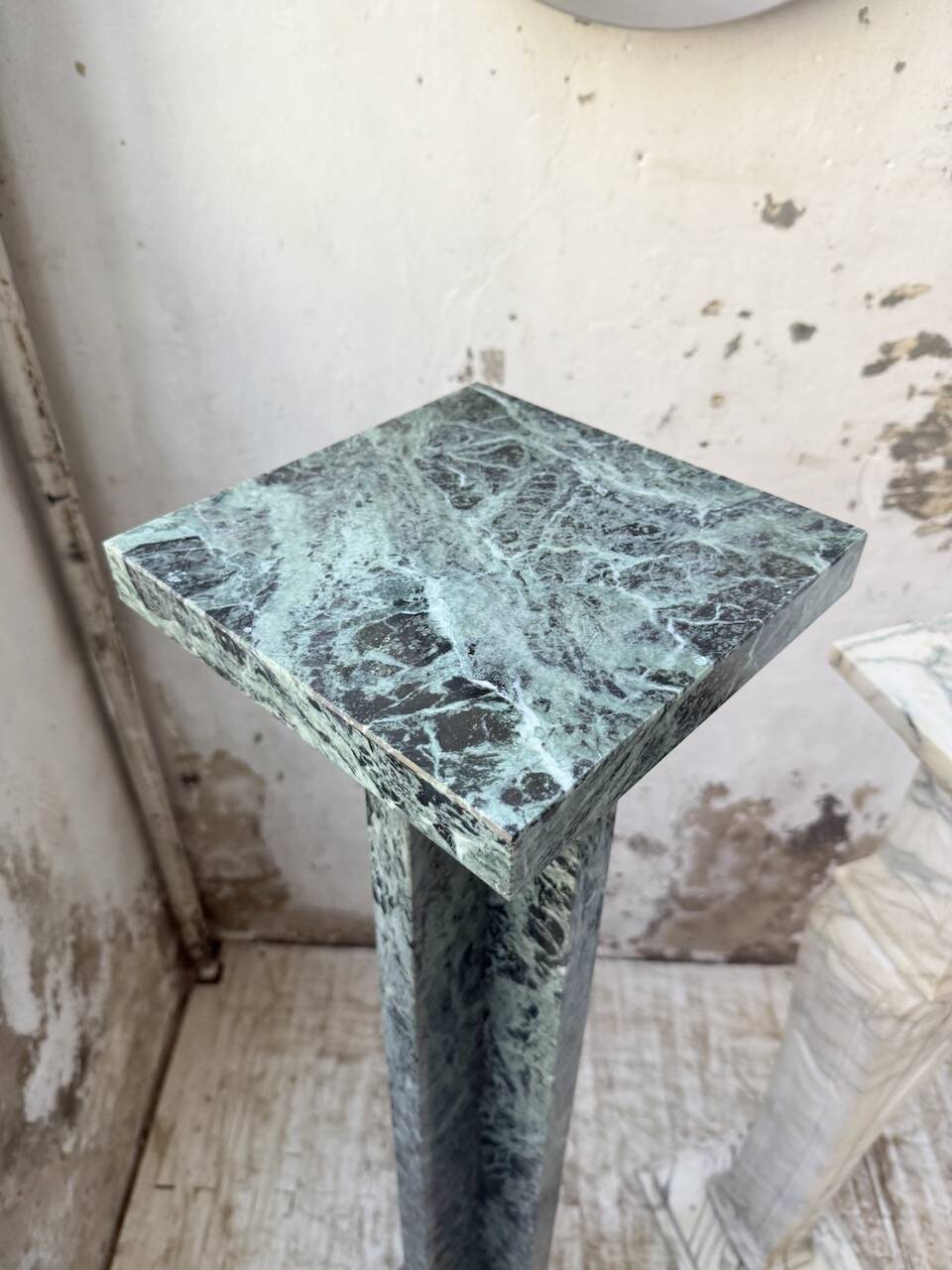 Set of 4 marble columns or pedestals.
