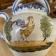 Crucible, ancient teapot made of terracotta.