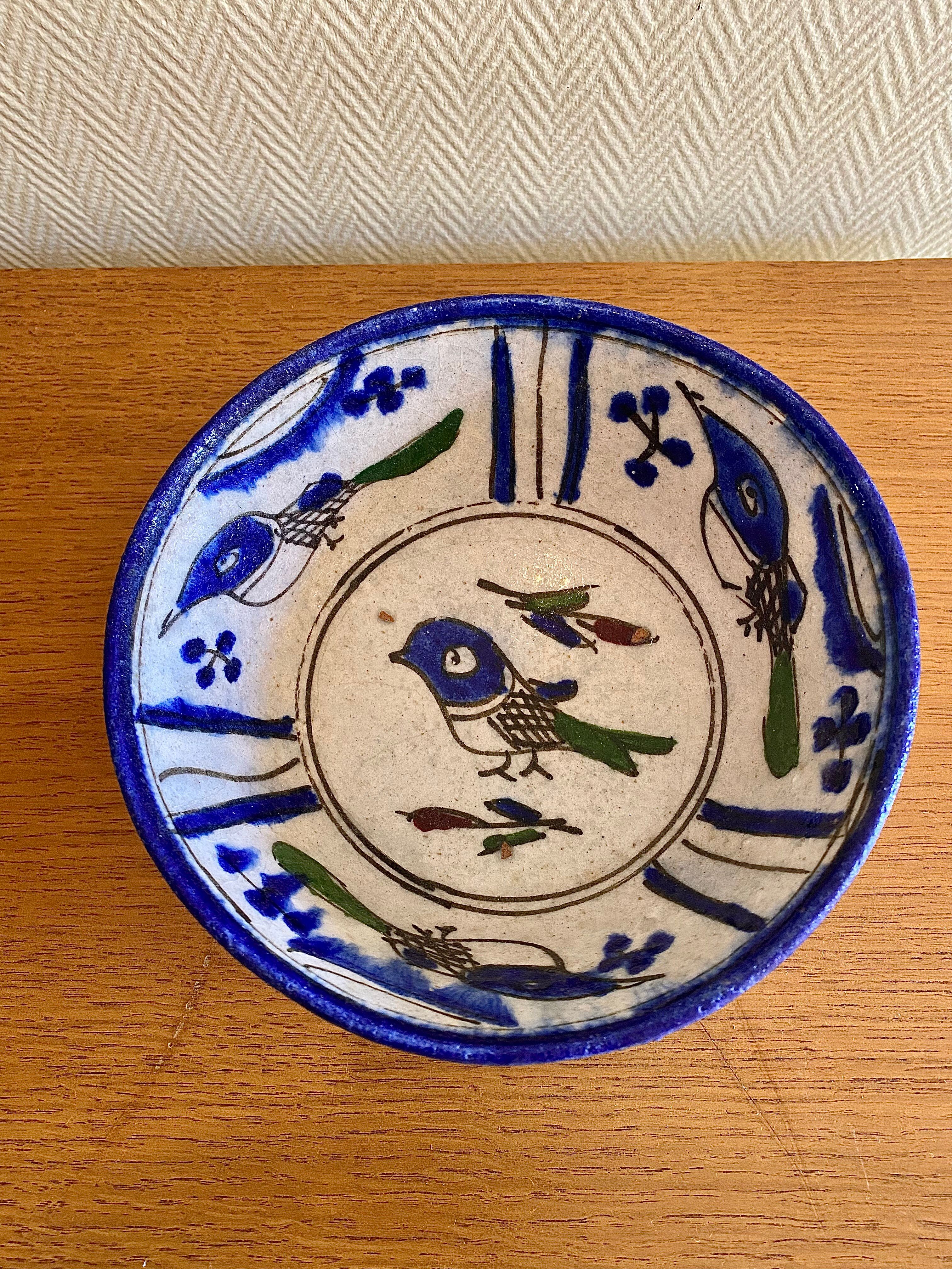 Ancient Persian ceramic bowl in Qajar style.