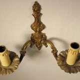 Pair of two-light wall lights in gilded bronze