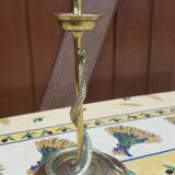 Pair of bronze candlesticks depicting a snake