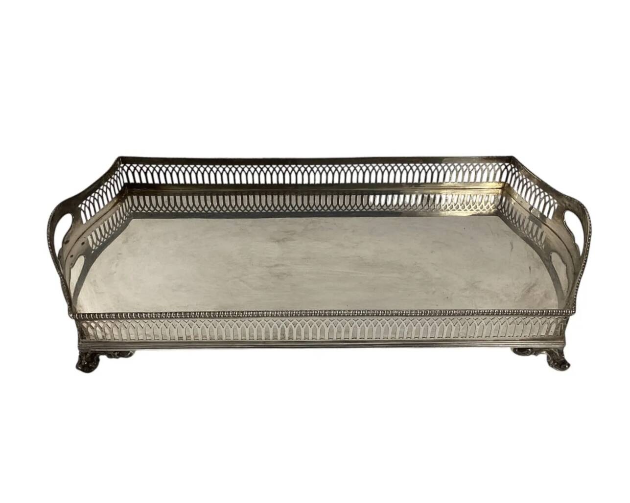 Important silver-plated metal table in the Louis XVI style.