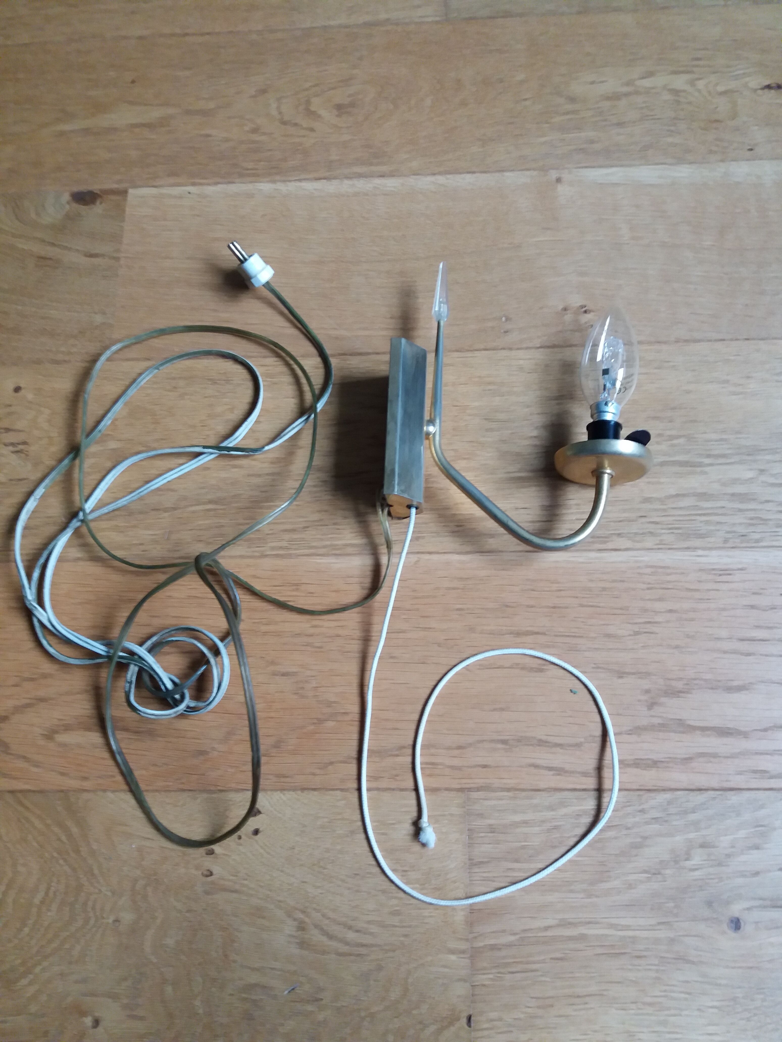 Brass wall lamp and pineapple glass