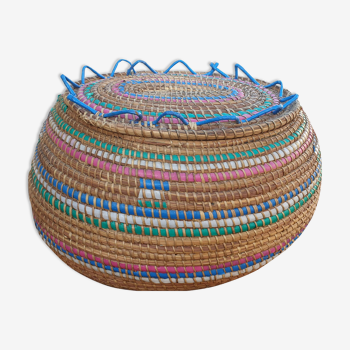 Rattan covered serpentine basket