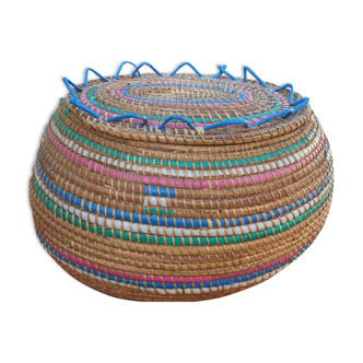 Rattan covered serpentine basket