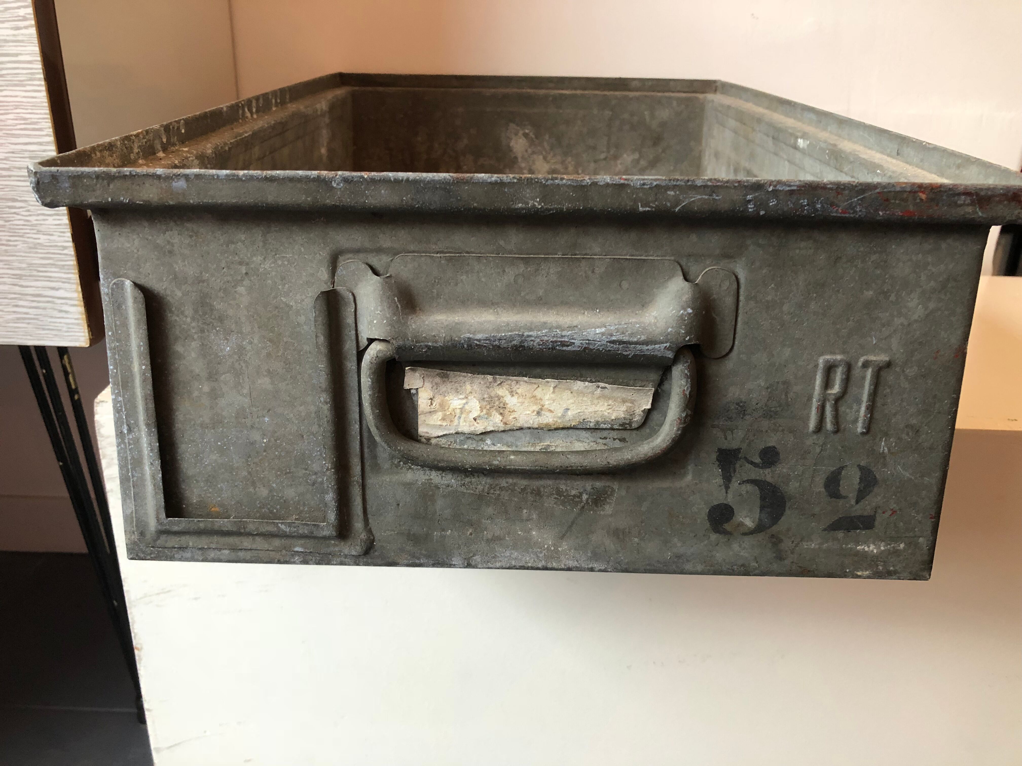 Old galvanized metal locker basket