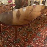 Extendable Louis XVI style mahogany dining table from the Directoire period