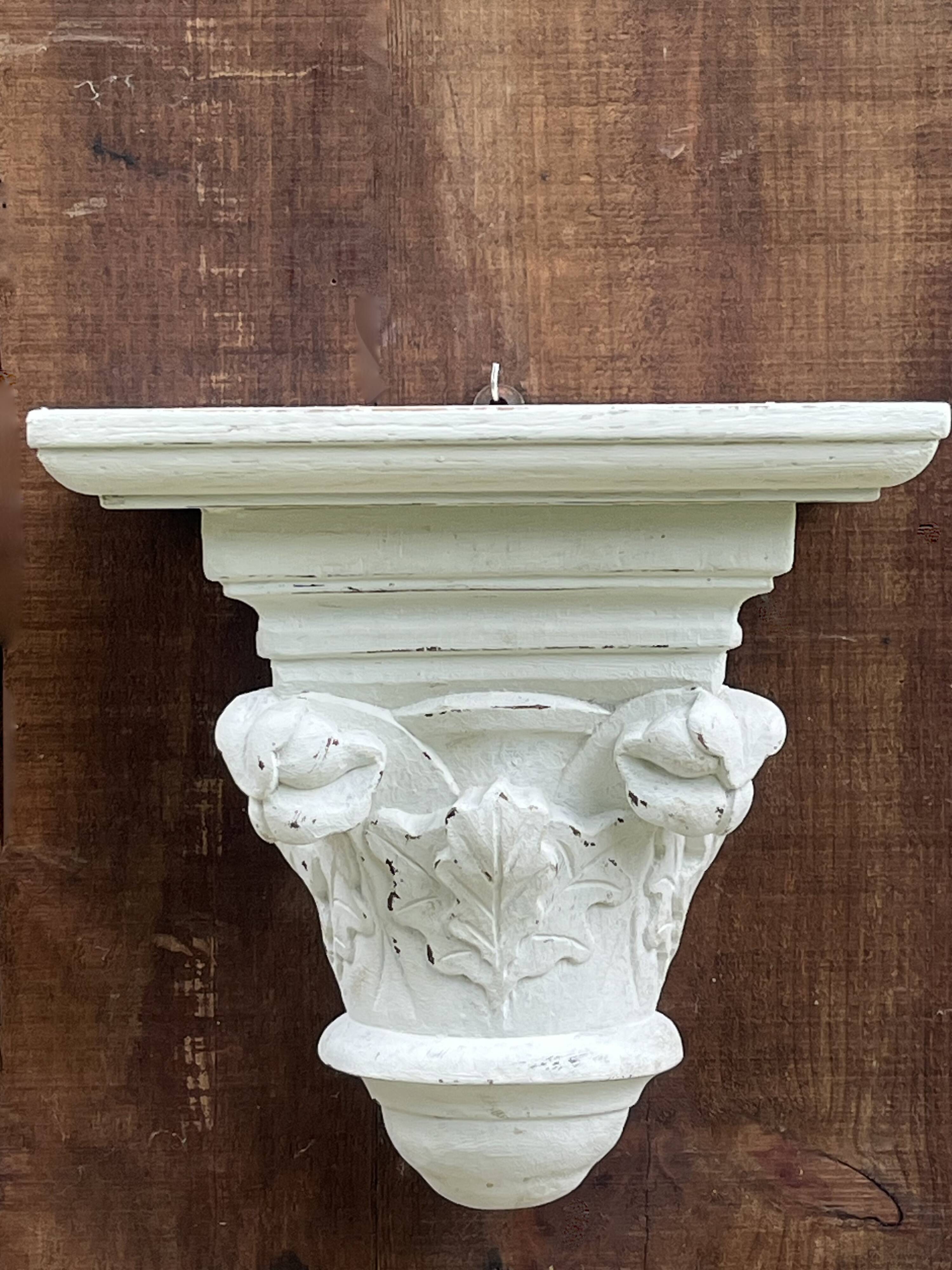 Carved wooden wall bracket