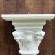 Carved wooden wall bracket