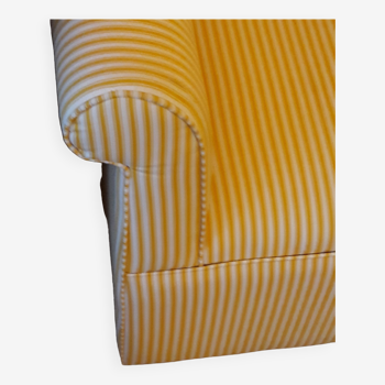 Club armchair in yellow and white striped fabric