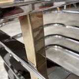 Coffee table with chrome base and mirrored glass top, vintage solar flare decor