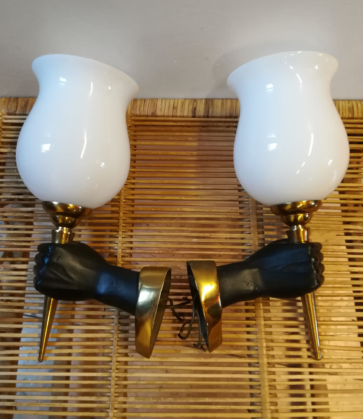 Pair of sconces in hands of Nubian by John Dévoluy